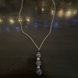 handmade pendant on silver chain. made of blue coral and white pearls